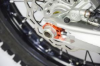 Afbeeldingen van Scar Achteras blokken Oranje Dikte As 25MM KTM Husqvarna GasGas